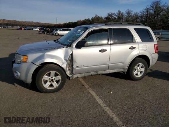 ✅ 2009 Ford Escape Hybrid • VIN: 1FMCU59349KB61444 • Lot: 82346514. Listed on Copart with 119,578 mi. Free auction sales archive from the USA and detailed vehicle history report at DreamBid. Image 1.