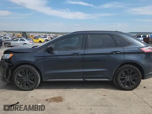 ✅ 2022 Ford Edge SE • VIN: 2FMPK4G97NBA67233 • Lot: 82543595. Listed on Copart with 106,354 mi. Free auction sales archive from the USA and detailed vehicle history report at DreamBid. Image 13.