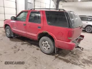 ✅ 2004 Chevrolet Blazer LS • VIN: 1GNDT13X34K157353 • Lot: 41089017. Wystawiony na IAAI z przebiegiem 104 539 mil. Bezpłatny archiwum sprzedaży aukcyjnych z USA i szczegółowy raport historii pojazdu na DreamBid. Zdjęcie 3.