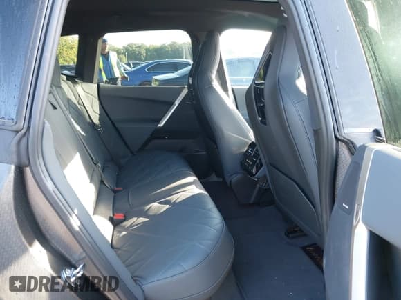 ✅ 2025 BMW iX xDrive50 • VIN: WB523CF07SCU29481 • Lot: 43130339. Listed on IAAI with 6,892 mi. Free auction sales archive from the USA and detailed vehicle history report at DreamBid. Image 8.