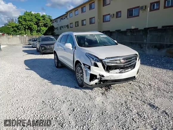 ✅ 2018 Cadillac XT5 Luxury FWD • VIN: 1GYKNCRS7JZ233235 • Lot: 89460595. Listed on Copart with 50,566 mi. Free auction sales archive from the USA and detailed vehicle history report at DreamBid. Image 13.