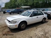 ✅ 1992 Nissan Stanza GXE • VIN: JN1FU21P5NT418908 • Лот: 67777655. Опубликован ранее на Copart с пробегом 351 776 миль. Бесплатный доступ к архиву аукционных продаж из США и подробный отчёт об истории автомобиля на DreamBid. Изображение 1.