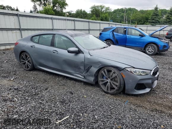 ✅ 2022 BMW 8 Series 840i • VIN: WBAGV4C05NCH54150 • Лот: 62773975. Опубликован ранее на Copart с пробегом 26 895 миль. Бесплатный доступ к архиву аукционных продаж из США и подробный отчёт об истории автомобиля на DreamBid. Изображение 4.