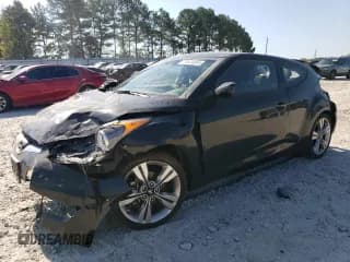 ✅ 2016 Hyundai Veloster • VIN: KMHTC6AD8GU257950 • Lot: 74624364. Wystawiony na Copart z przebiegiem 77 796 mil. Bezpłatny archiwum sprzedaży aukcyjnych z USA i szczegółowy raport historii pojazdu na DreamBid. Zdjęcie 1.