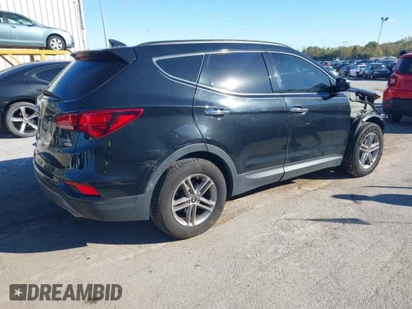 ✅ 2017 Hyundai Santa Fe 2.4L • VIN: 5XYZUDLB4HG448733 • Lot: 43522113. Listed on IAAI with 156,802 mi. Free auction sales archive from the USA and detailed vehicle history report at DreamBid. Image 4.