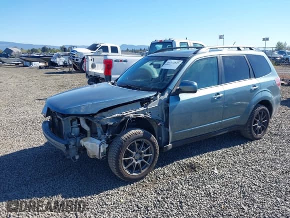 ✅ 2012 Subaru Forester X Premium • VIN: JF2SHADC2CH457153 • Lot: 43372829. Listed on IAAI with 180,872 mi. Free auction sales archive from the USA and detailed vehicle history report at DreamBid. Image 2.