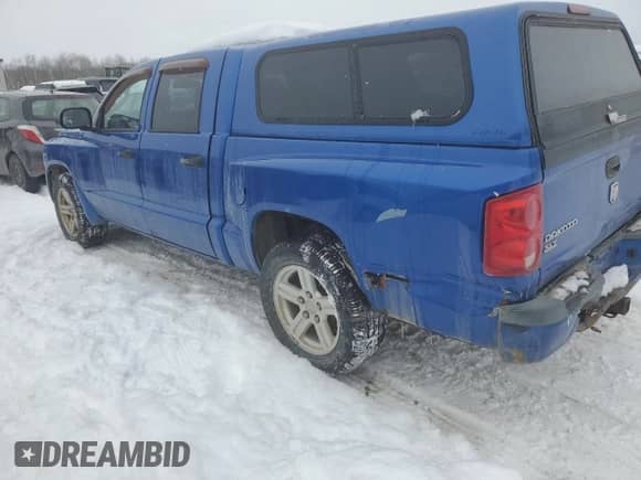 2008 Dodge Dakota z VIN 1D7HW68K28S503819, wystawiony jako Copart lot #44348935 z przebiegiem 141 005 mil mil oraz Szkoda całkowita • Salvage title. Historia ofert i sprzedaży dostępna na DreamBid. Obrazek 2.