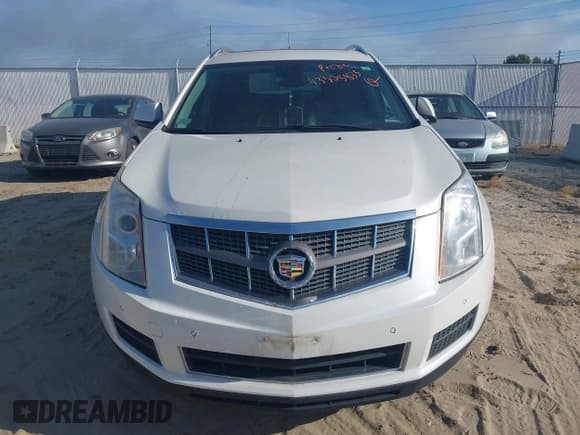 ✅ 2010 Cadillac SRX Luxury Collection • VIN: 3GYFNAEY7AS565057 • Lot: 43305835. Wystawiony na IAAI z przebiegiem 141 492 mil. Bezpłatny archiwum sprzedaży aukcyjnych z USA i szczegółowy raport historii pojazdu na DreamBid. Zdjęcie 6.