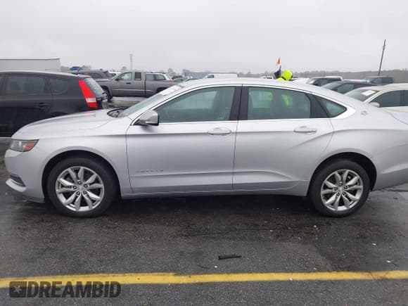 ✅ 2017 Chevrolet Impala LT • VIN: 2G1105S34H9155377 • Лот: 43571980. Опубликован ранее на IAAI с пробегом 172 826 миль. Бесплатный доступ к архиву аукционных продаж из США и подробный отчёт об истории автомобиля на DreamBid. Изображение 14.