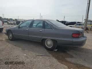 1991 Chevrolet Caprice z VIN 1G1BN53E4MW194283, wystawiony jako Copart lot #71869145 z przebiegiem 33 840 mil mil oraz Szkoda całkowita • Salvage title. Historia ofert i sprzedaży dostępna na DreamBid. Obrazek 2.