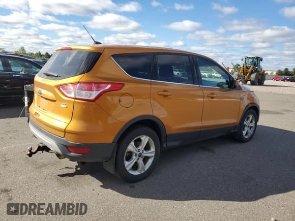✅ 2016 Ford Escape SE • VIN: 1FMCU9GX4GUB98928 • Lot: 82652455. Listed on Copart with 128,490 mi. Free auction sales archive from the USA and detailed vehicle history report at DreamBid. Image 3.