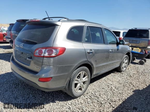 ✅ 2012 Hyundai Santa Fe Limited • VIN: 5XYZK4AG6CG099703 • Lot: 77861484. Listed on Copart with 243,905 mi. Free auction sales archive from the USA and detailed vehicle history report at DreamBid. Image 3.