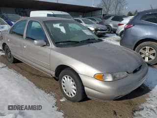 ✅ 1996 Ford Contour GL • VIN: 1FALP6530TK105053 • Лот: 41287231. Опубликован ранее на IAAI с пробегом 115 177 миль. Бесплатный доступ к архиву аукционных продаж из США и подробный отчёт об истории автомобиля на DreamBid. Изображение 1.