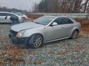 ✅ 2012 Cadillac CTS Premium • VIN: 1G6DP5E38C0130970 • Lot: 94063395. Listed on Copart with 107,485 mi. Free auction sales archive from the USA and detailed vehicle history report at DreamBid. Image 1.