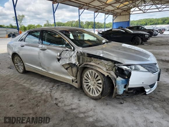 ✅ 2015 Lincoln MKZ • VIN: 3LN6L2JK8FR616546 • Lot: 68147855. Listed on Copart with 115,392 mi. Free auction sales archive from the USA and detailed vehicle history report at DreamBid. Image 4.
