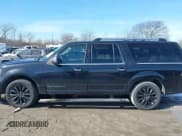✅ 2015 Lincoln Navigator • VIN: 5LMJJ3JT3FEJ00335 • Lot: 41585554. Listed on IAAI with 163,841 mi. Free auction sales archive from the USA and detailed vehicle history report at DreamBid. Image 14.