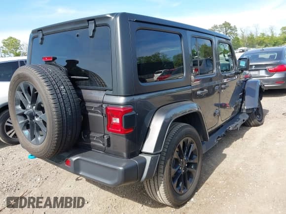 ✅ 2023 Jeep Wrangler Sahara • VIN: 1C4JJXP69PW684803 • Lot: 42214320. Listed on IAAI with 37,723 mi. Free auction sales archive from the USA and detailed vehicle history report at DreamBid. Image 4.