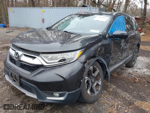 ✅ 2019 Honda CR-V Touring • VIN: 2HKRW2H99KH602129 • Lot: 43855817. Listed on IAAI with 91,135 mi. Free auction sales archive from the USA and detailed vehicle history report at DreamBid. Image 2.