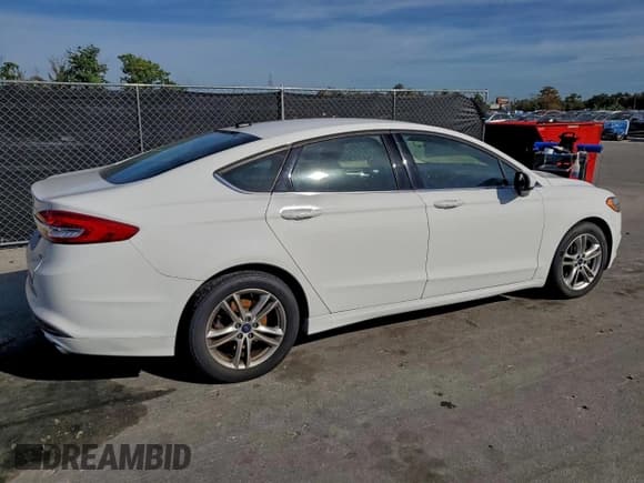 ✅ 2018 Ford Fusion SE • VIN: 3FA6P0H77JR113510 • Лот: 94438405. Опубликован ранее на Copart с пробегом 125 494 миль. Бесплатный доступ к архиву аукционных продаж из США и подробный отчёт об истории автомобиля на DreamBid. Изображение 3.