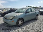 ✅ 2004 Ford Focus ZTS • VIN: 1FAFP38Z04W119041 • Lot: 62460295. Listed on Copart with 171,814 mi. Free auction sales archive from the USA and detailed vehicle history report at DreamBid. Image 1.