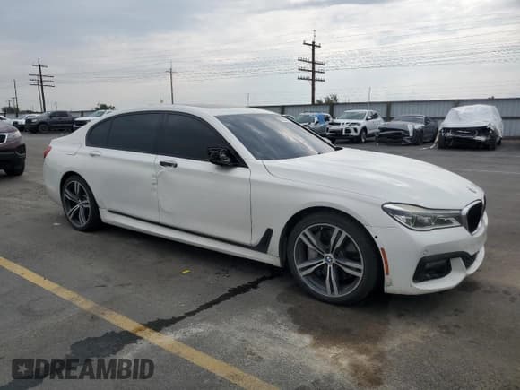 ✅ 2016 BMW 7 Series 750i xDrive • VIN: WBA7F2C54GG416261 • Lot: 70702505. Listed on Copart with 99,547 mi. Free auction sales archive from the USA and detailed vehicle history report at DreamBid. Image 4.