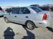 2003 Hyundai Accent GL with VIN KMHCG45C63U413388, listed as a Copart auction lot 88979235 with 240,928 mi miles and Salvage title. Bid and sale history available at DreamBid. Image 2.
