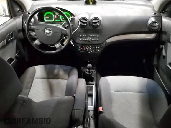 2009 Chevrolet Aveo 1LT z VIN KL1TD66E59B395194, wystawiony jako Copart lot #87202024 z przebiegiem 105 944 mil mil oraz Czysty tytuł • Clean title. Historia ofert i sprzedaży dostępna na DreamBid. Obrazek 8.