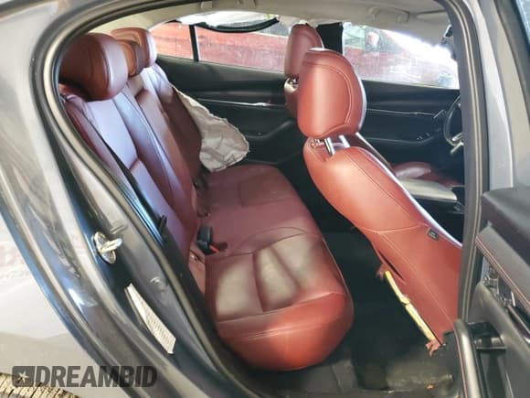 ✅ 2023 Mazda 3 S Carbon Edition • VIN: 3MZBPBCM5PM360027 • Лот: 70913525. Опубликован ранее на Copart с пробегом 43 307 миль. Бесплатный доступ к архиву аукционных продаж из США и подробный отчёт об истории автомобиля на DreamBid. Изображение 10.