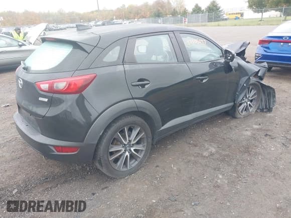 ✅ 2018 Mazda CX-3 Touring • VIN: JM1DKFC78J1311775 • Лот: 43405047. Опубликован ранее на IAAI с пробегом 56 021 миль. Бесплатный доступ к архиву аукционных продаж из США и подробный отчёт об истории автомобиля на DreamBid. Изображение 4.