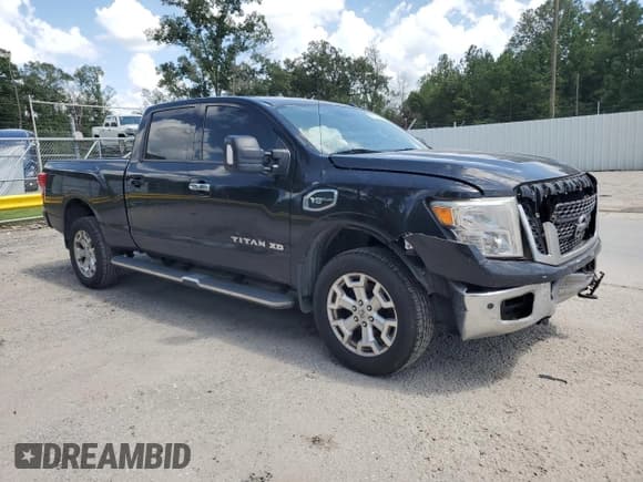 ✅ 2017 Nissan Titan SV • VIN: 1N6AA1F25HN549415 • Лот: 64027474. Опубликован ранее на Copart с пробегом 186 736 миль. Бесплатный доступ к архиву аукционных продаж из США и подробный отчёт об истории автомобиля на DreamBid. Изображение 4.