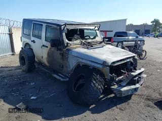 ✅ 2009 Jeep Wrangler Unlimited X • VIN: 1J4GA39199L765982 • Лот: 43401975. Опубликован ранее на IAAI с пробегом Не указан. Бесплатный доступ к архиву аукционных продаж из США и подробный отчёт об истории автомобиля на DreamBid. Изображение 1.