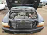 2004 Dodge Dakota z VIN 1D7GL12K84S573433, wystawiony jako Copart lot #49617055 z przebiegiem 267 474 mil mil oraz Szkoda całkowita • Salvage title. Historia ofert i sprzedaży dostępna na DreamBid. Obrazek 11.