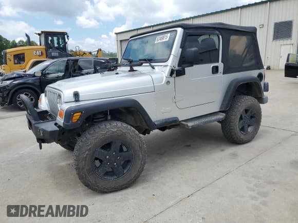 ✅ 2005 Jeep Wrangler X • VIN: 1J4FA39S55P353789 • Lot: 62469015. Wystawiony na Copart z przebiegiem 143 817 mil. Bezpłatny archiwum sprzedaży aukcyjnych z USA i szczegółowy raport historii pojazdu na DreamBid. Zdjęcie 1.