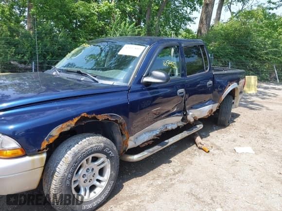 ✅ 2004 Dodge Dakota SLT • VIN: 1D7HG48N94S643579 • Lot: 42457885. Listed on IAAI with 165,445 mi. Free auction sales archive from the USA and detailed vehicle history report at DreamBid. Image 6.