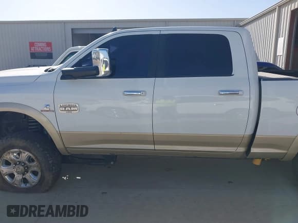 ✅ 2014 Ram 2500 Longhorn • VIN: 3C6UR5GLXEG244401 • Lot: 41779709. Listed on IAAI with 180,760 mi. Free auction sales archive from the USA and detailed vehicle history report at DreamBid. Image 14.