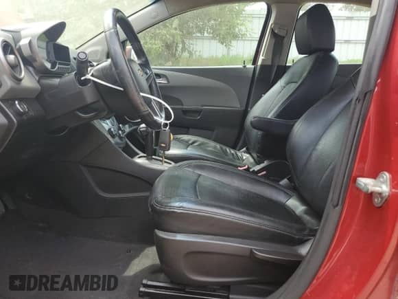 2012 Chevrolet Sonic LTZ with VIN 1G1JE5SH5C4152268, listed as a Copart auction lot 61047295 with 137,502 mi miles and Salvage title. Bid and sale history available at DreamBid. Image 7.