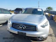 ✅ 2016 Infiniti QX70 • VIN: JN8CS1MWXGM752064 • Lot: 42734018. Listed on IAAI with 133,885 mi. Free auction sales archive from the USA and detailed vehicle history report at DreamBid. Image 12.
