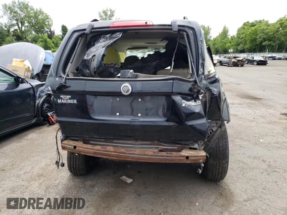 ✅ 2009 Mercury Mariner Hybrid • VIN: 4M2CU39339KJ07135 • Lot: 56993883. Listed on Copart with 203,327 mi. Free auction sales archive from the USA and detailed vehicle history report at DreamBid. Image 6.