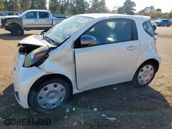 ✅ 2012 Scion iQ • VIN: JTNJJXB03CJ013861 • Lot: 92483515. Listed on Copart with 82,194 mi. Free auction sales archive from the USA and detailed vehicle history report at DreamBid. Image 1.