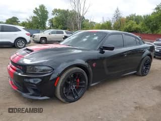 ✅ 2022 Dodge Charger SRT Hellcat Widebody • VIN: 2C3CDXL99NH199819 • Lot: 43450586. Wystawiony na IAAI z przebiegiem 21 491 mil. Bezpłatny archiwum sprzedaży aukcyjnych z USA i szczegółowy raport historii pojazdu na DreamBid. Zdjęcie 2.