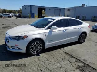 ✅ 2018 Ford Fusion Titanium • VIN: 3FA6P0SU0JR205119 • Lot: 69353135. Listed on Copart with 96,606 mi. Free auction sales archive from the USA and detailed vehicle history report at DreamBid. Image 1.