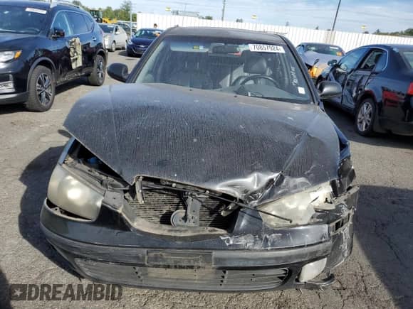 2003 Hyundai Elantra GT z VIN KMHDN55DX3U097387, wystawiony jako Copart lot #70857924 z przebiegiem 142 100 mil mil oraz Szkoda całkowita • Salvage title. Historia ofert i sprzedaży dostępna na DreamBid. Obrazek 5.
