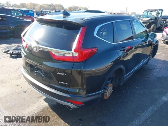 ✅ 2018 Honda CR-V Touring • VIN: 7FARW2H90JE052921 • Lot: 43671364. Listed on IAAI with 101,261 mi. Free auction sales archive from the USA and detailed vehicle history report at DreamBid. Image 4.