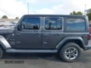 ✅ 2021 Jeep Wrangler Unlimited Sahara • VIN: 1C4HJXEN4MW503014 • Lot: 41900234. Listed on IAAI with 16,444 mi. Free auction sales archive from the USA and detailed vehicle history report at DreamBid. Image 14.