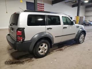 ✅ 2007 Dodge Nitro SXT • VIN: 1D8GU28KX7W570181 • Лот: 80915645. Опубликован ранее на Copart с пробегом 86 199 миль. Бесплатный доступ к архиву аукционных продаж из США и подробный отчёт об истории автомобиля на DreamBid. Изображение 3.
