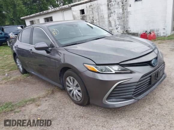 2023 Toyota Camry Hybrid LE z VIN 4T1C31AK8PU606221, wystawiony jako IAAI lot #41957788 z przebiegiem 52 532 mil mil oraz . Historia ofert i sprzedaży dostępna na DreamBid. Obrazek 1.