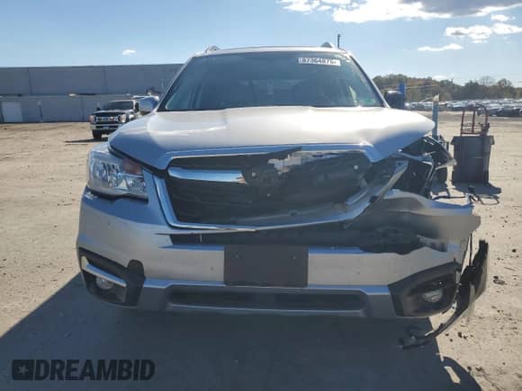 2017 Subaru Forester Limited with VIN JF2SJALC2HH407768, listed as a Copart auction lot 87364875 with 36,703 mi miles and Salvage title. Bid and sale history available at DreamBid. Image 5.
