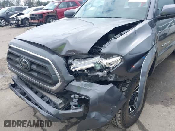 ✅ 2022 Toyota Tacoma SR • VIN: 3TYSZ5AN0NT079104 • Lot: 41516590. Wystawiony na IAAI z przebiegiem 22 203 mil. Bezpłatny archiwum sprzedaży aukcyjnych z USA i szczegółowy raport historii pojazdu na DreamBid. Zdjęcie 6.