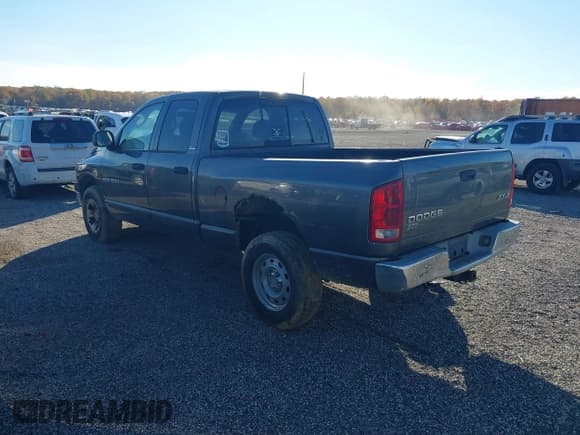 ✅ 2002 Dodge 1500 • VIN: 3D7HU18N52G167097 • Lot: 43551064. Listed on IAAI with 252,741 mi. Free auction sales archive from the USA and detailed vehicle history report at DreamBid. Image 3.