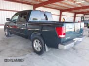 ✅ 2004 Nissan Titan XE • VIN: 1N6AA07A14N582728 • Lot: 42032653. Listed on IAAI with 117,601 mi. Free auction sales archive from the USA and detailed vehicle history report at DreamBid. Image 3.